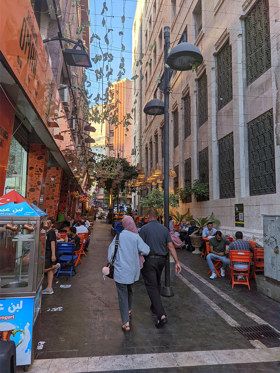 A busy, colourful street in downtown Amman